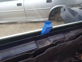 Regulador manual de la ventanilla delantera