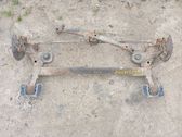 Rear axle beam with reductor