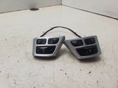 Steering wheel buttons/switches