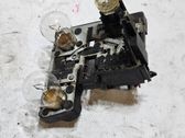 Tail light bulb cover holder