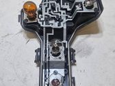 Tail light bulb cover holder