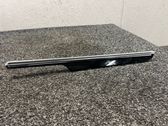 Front door trim bar