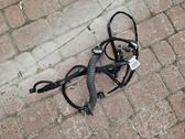 Front door check strap stopper