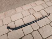 Headlight wiper arm