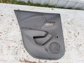 Front door card panel trim