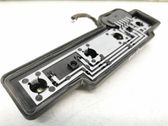 Tail light bulb cover holder