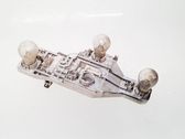 Tail light bulb cover holder