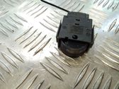 Bouton commande réglage hauteur de phares