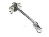 Front door check strap stopper