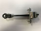 Rear door check strap stopper