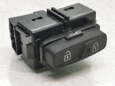 Botón interruptor de bloqueo de puertas