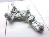 Tail light bulb cover holder