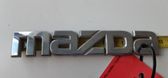 Manufacturers badge/model letters