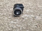 Bouton interrupteur de trappe à essence