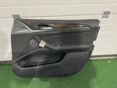 Front door card panel trim