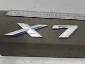 Manufacturers badge/model letters