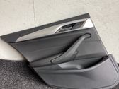 Front door card panel trim