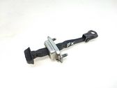 Front door check strap stopper