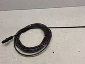 Fuel cap flap release cable