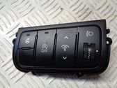 Bouton commande réglage hauteur de phares