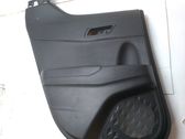 Moldura del tarjetero de la puerta trasera
