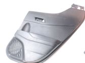 Moldura del tarjetero de la puerta trasera