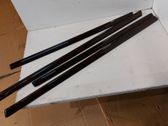 Front door trim bar