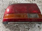 Tail light bulb cover holder