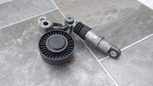 Alternator belt tensioner