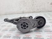Alternator belt tensioner