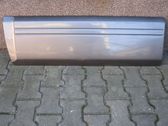 Front door trim bar