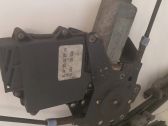 Sliding door window regulator with motor