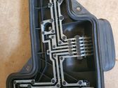 Tail light bulb cover holder