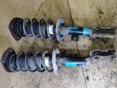 Front shock absorber with coil spring