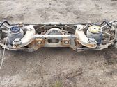 Rear axle beam with reductor