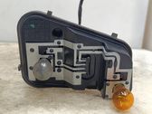 Tail light bulb cover holder