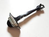 Rear door check strap stopper