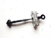 Front door check strap stopper