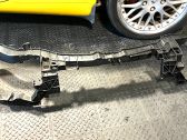 Radiator support slam panel