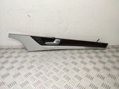 Front door trim bar