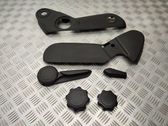 Front door seat control surround trim