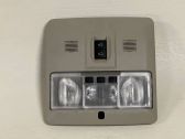 Headlining lighting console trim