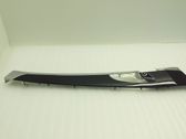 Front door trim bar