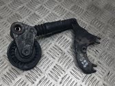 Alternator belt tensioner