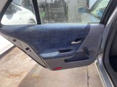 Rear door manual window regulator