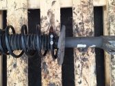 Front shock absorber with coil spring