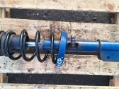 Front shock absorber with coil spring
