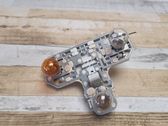 Tail light bulb cover holder