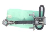 Front door check strap stopper