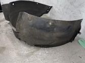 Front wheel arch liner splash guards